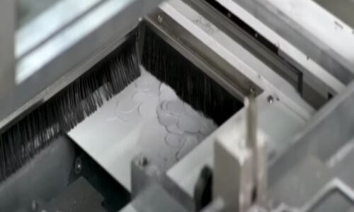 brush under paper tray of blanking machine